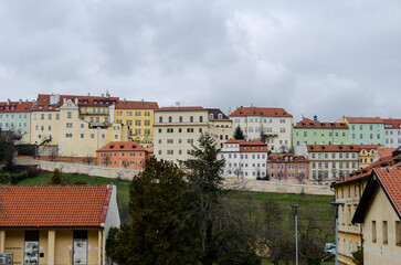 The view of historical buildings in Uvoz Street and the Saint John Vineyard in Hradcany, Prague, the Czech Republic