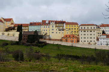 Obraz premium The view of historical buildings in Uvoz Street and the Saint John Vineyard in Hradcany, Prague, the Czech Republic