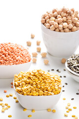 Bowl of raw chana dal on white background