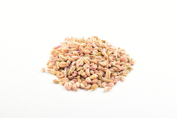 Carom seeds on white background