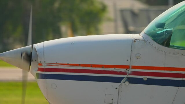 Flying pilot lessons and flight training for recreational pilot permit. Plane engine with working propeller. Departure warm up of a small aircraft. Private single engine airplane at Municipal Airport.
