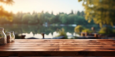 A wooden table smoothly melding with the blurred lakeside cottage backdrop, creating a seamless blend with the softly blurred surroundings. - obrazy, fototapety, plakaty