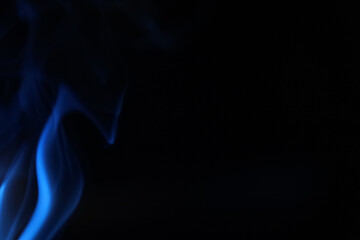 Blue smoke on a dark background, fog pattern, detailed smoke shapes	