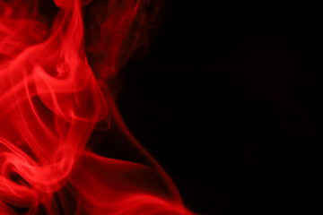 Obraz premium Red smoke on a dark background, colourful abstract, red fog, minimalistic background