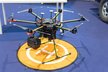 Drone with multiple rotors on display.