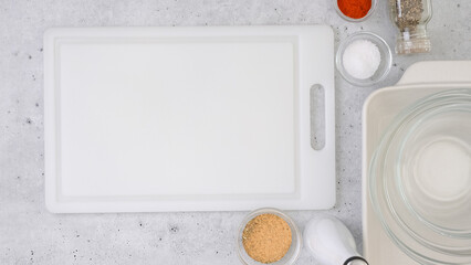 Butternut squash soup recipe, preparation process. Raw vegetables and spices close-up on the kitchen table