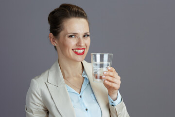 happy stylish business woman in light business suit