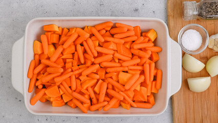 Roasted butternut squash soup recipe. Peeled and seedless squash cubes, carrot, onion, garlic, and...