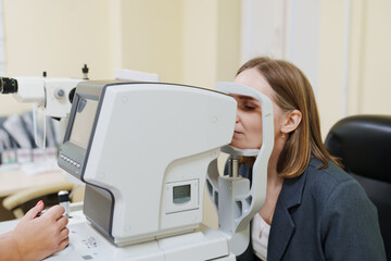 Middle-aged woman in ophthalmologist's office.