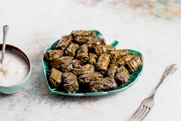Dolma - stuffed grape leaves with rice and meat.