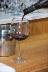 red wine poured into a glass