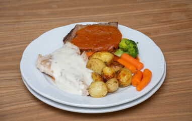 Pork steak with carrots and broccoli