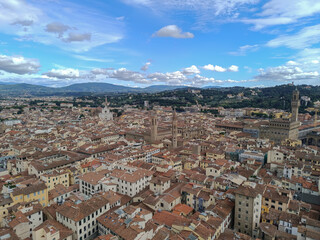 Fototapeta na wymiar Panorama in aerial view over Florence and several landmarks towers, ITALY