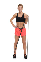 Woman exercising with elastic resistance band on white background