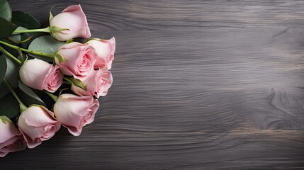 Bouquet of roses on a gray wooden background