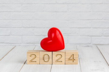 heart on 2024 new year block ,  love concept