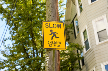 Pedestrian sign in urban street. Vibrant crosswalk symbol, city life, safety concept. Busy...