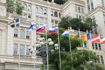 Flags of Different Countries in European Union Flying Outside a Building