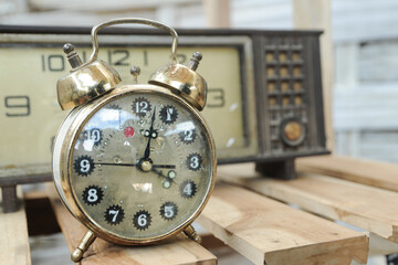 A Classical alarm clock that still uses a bell as a charming round alarm clock