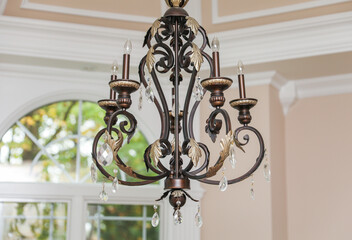 chandelier with intricate crystal details, casting elegant light patterns in a luxurious setting,...
