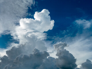 Blue sky fluffy white clouds on summer season bright clear skyline with beautiful cloudscape. Panorama blue sky clouds pattern on daylight with copy space. Cumulus cloudscape air climate sunny day