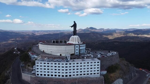A panoramic view of the Cristo Rey statue atop Cerro del Cubilete mountain in the beautiful Mexican countryside of Guanajuato