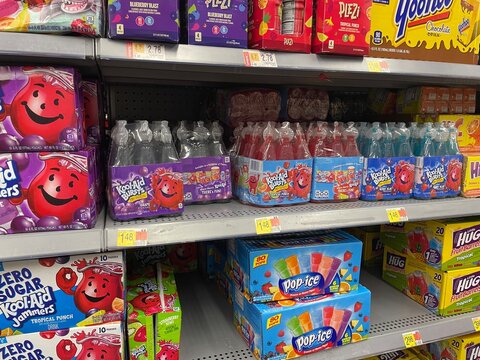 Walmart grocery store kids drinks on shelves Kool aid and hugs