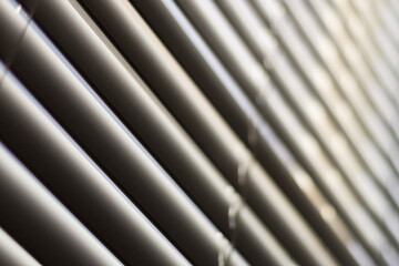 Sunlight peeking through blinds