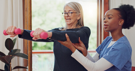 Physical therapy, exercise and senior woman with dumbbell, weightlifting and training arms and muscle. Strong, fitness and old person with nurse or physiotherapist to help in rehabilitation workout - Powered by Adobe