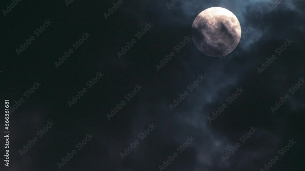 Sticker atmospheric video with full moon and clouds. close-up. mystical and atmospheric content. time lapse 