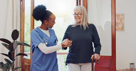 Senior woman, nurse and help with walking stick for rehabilitation, wellness and talk with smile....