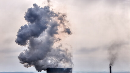 Chimney with smoke and black smoke dramatically