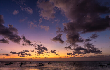 Naklejka na ściany i meble purple sunset at the beach