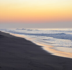Beautiful sunrise over the black sand beach of Port of San Jose in Guatemala