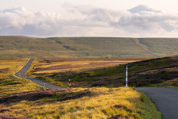 a quiet road running through the North Pennines Area of Outstanding Natural Beauty (ANOB), near Stanhope, Durham, UK