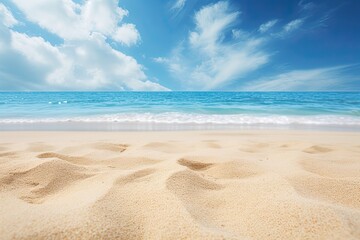 Fototapeta na wymiar Closeup of Sand on Beach and Blue Summer Sky - Vivid Beach Scene