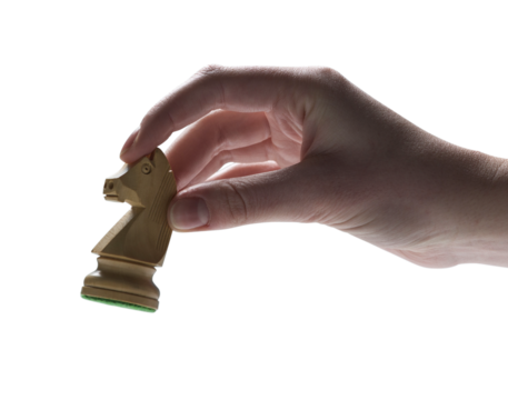 Player holding a chess piece