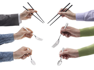 Set of hands holding chopsticks, forks and spoons