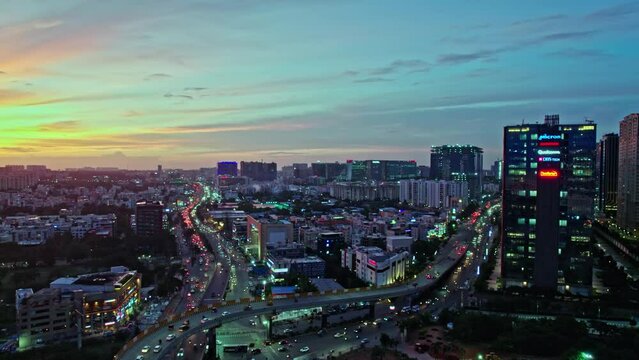 aerial view of HITEC City in  hyderabad, telangana with buildings and traffic during sunset drone shot