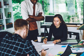 Young creative team working on startup project