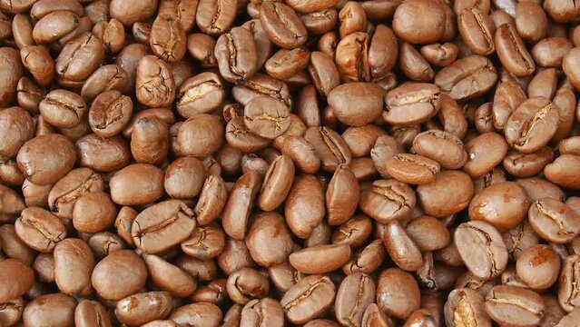 Roasted coffee beans close up.