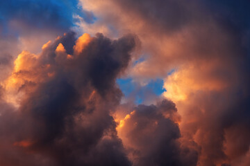 Dramatic sky in summer sunset with vibrant clouds