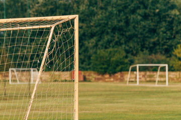 Soccer goal post and net on outdoor training pitch