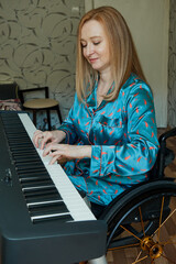Disabled woman using wheelchair playing piano
