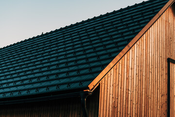 Alpine architecture, new roof of a house in slovenian rural village - obrazy, fototapety, plakaty