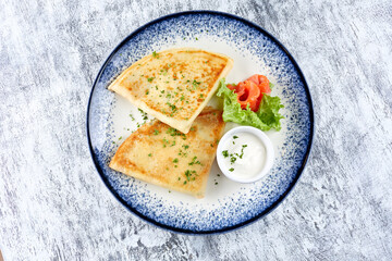 pancakes with sour cream and vegetables