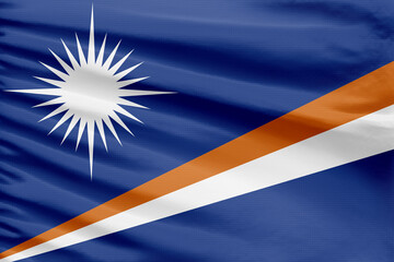 Marshall Islands flag background is depicted on a sport stitch cloth fabric with folds.