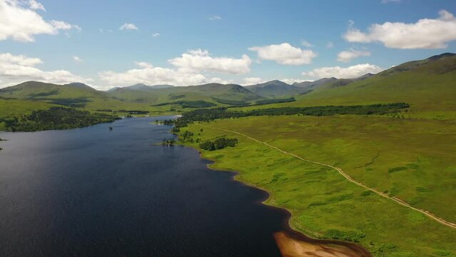 Scottish Highlands. Loch in Scotland, Loch Tulla Aerial Shot Near Glen Coe, Scotland, UK. Landscape of Scotland. Scottish nature. United Kingdom.