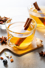 Autumn or Winter Hot Tea, Herbal Tea with Spices on Bright Background