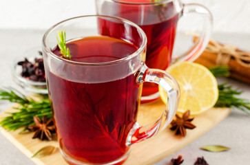 Herbal Tea, Red Tea in Glass Mugs, Autumn or Winter Drink